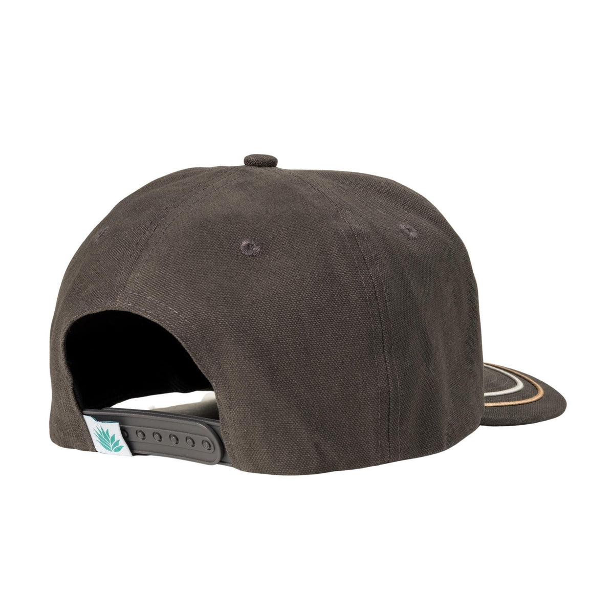 Back view of Tiro Muerto Hat showing a gray adjustable strap and teal leaf motif tag.