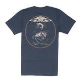 Charros and Aliens Tee navy shirt with a large circular beige design featuring a bucking horse beneath a hovering UFO.