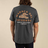 Back view of dark gray T shirt with large circular rattlesnake design and arched text