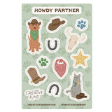 Sticker sheet with cowboy-themed stickers on a light green background
