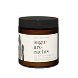 Saguaro Cactus candle in amber jar with black lid and white label