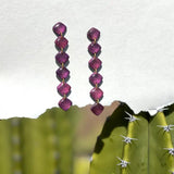 Amber Dust Dangle Earrings featuring stacked sparkly purple diamond beads on a gold chain