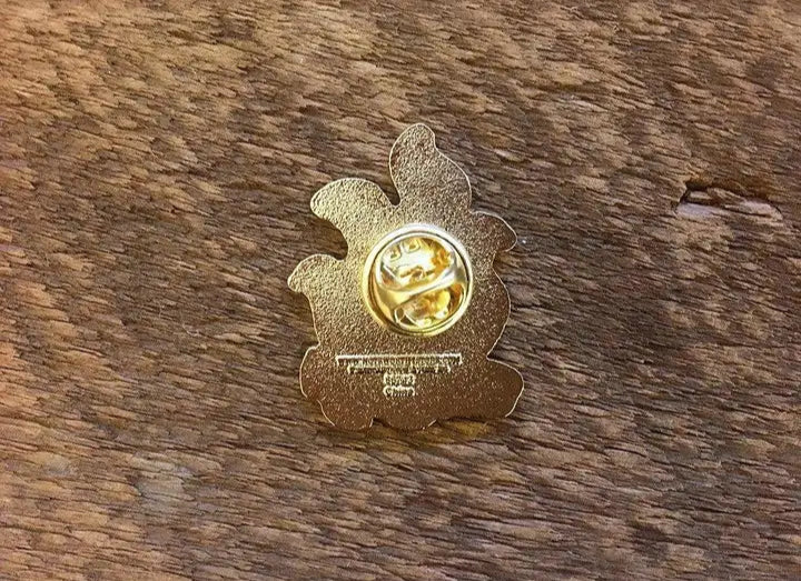 Back of Campfire enamel pin with butterfly clutch
