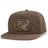 Brown Velociwrangler flatbrim cap with a centered embroidered western patch on the front