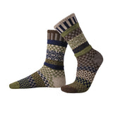 Two bamboo wool crew socks in earthy brown green and navy with geometric motifs