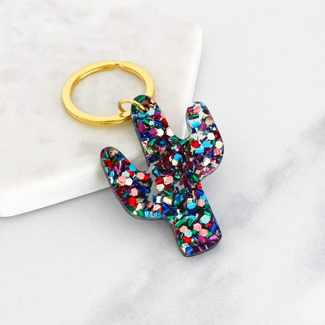 Acrylic cactus keyring with multicolor glitter on a gold ring