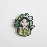 Cacti Queen sticker showing a stylized woman surrounded by succulents