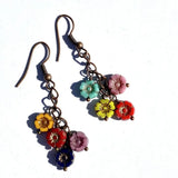 Cascade Flower Dangle Earrings with multicolor flower charms on bronze chains