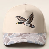 Beige Flying Mallard embroidered camo brim trucker hat front view