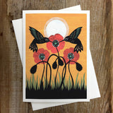 In The Wink of the Poppy's Eye greeting card showing two hummingbirds above red poppies against an orange sunset.