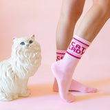 Pink ribbed crew socks with bold CAT LADY lettering and darker pink stripes.