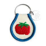 Tomato embroidered patch keychain with cream background blue trim and metal ring