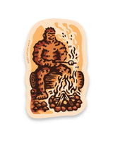 Squatch the bigfoot sits by a campfire roasting a marshmallow sticker