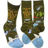 Olive green road trip socks featuring a van, mountains, and a roadside map motif.