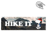 Hike It bumper magnet with Snoopy walking beside rugged mountains and bold HIKE IT lettering