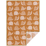 Gardenland double cloth dish towel with white snail patterns on orange fabric