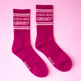 Cool Ass Granny Ribbed Crew Socks pair in magenta with white stripes and logo on the cuff