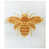 Queen Bee Swedish Dishcloth with a golden bee graphic on textured white fabric.