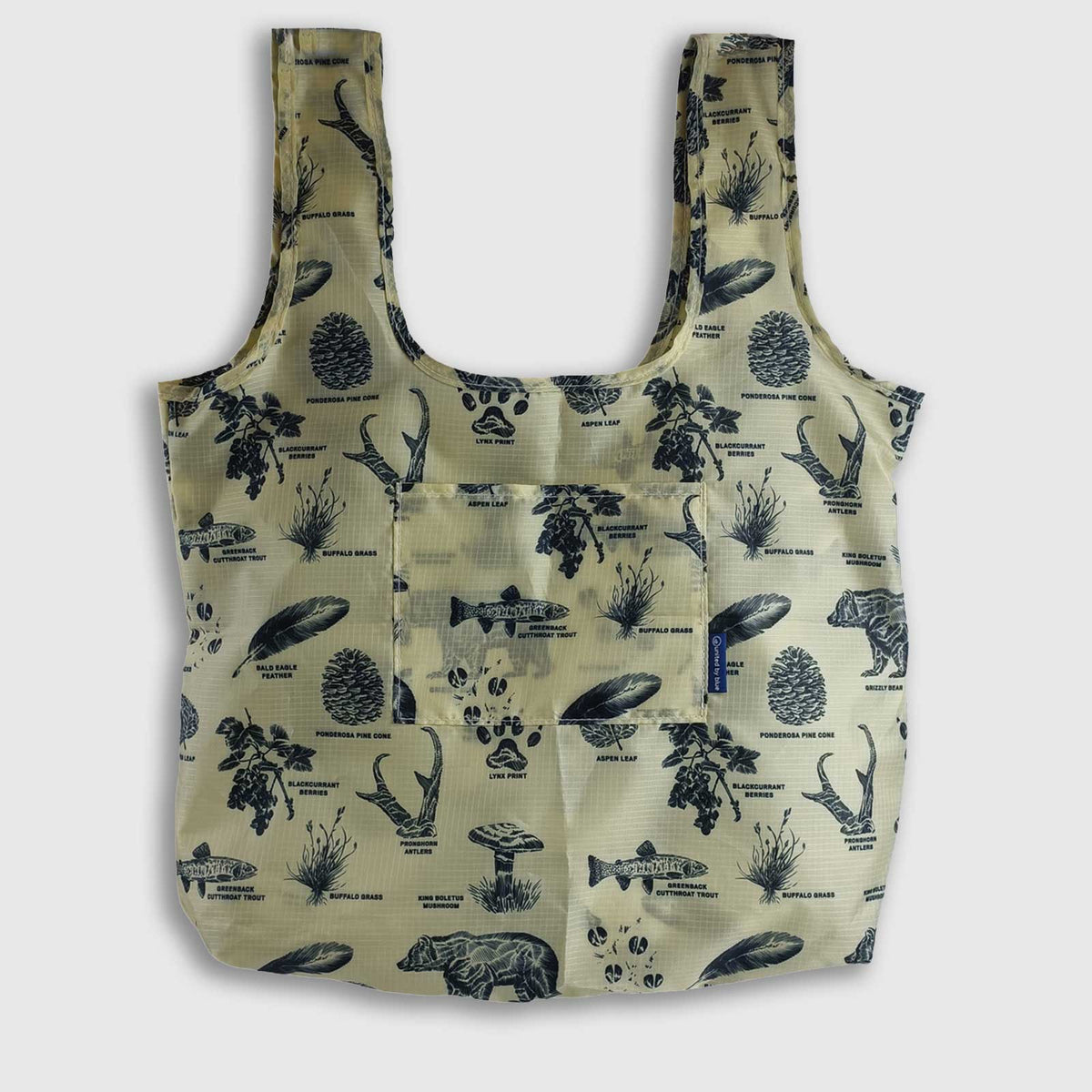 Khaki packable tote with botanical and boat illustrations and a front pocket