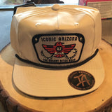Beige unstructured hat with the iconic Arizona patch The Desert Bites Back centered on the front.