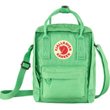 Bright green Fjallraven Kanken Sling compact backpack with top handles and front pocket