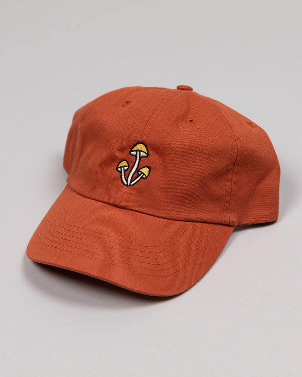 Orange Shroom Dad Hat with mushroom embroidery on the front.