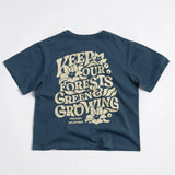 Navy blue Keep Our Forests Green and Growing boxy crop tee laid flat with cream back graphic.