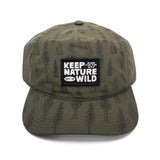 Olive green Conifers Trail hat with a forest tree print and a front Keep Nature Wild patch