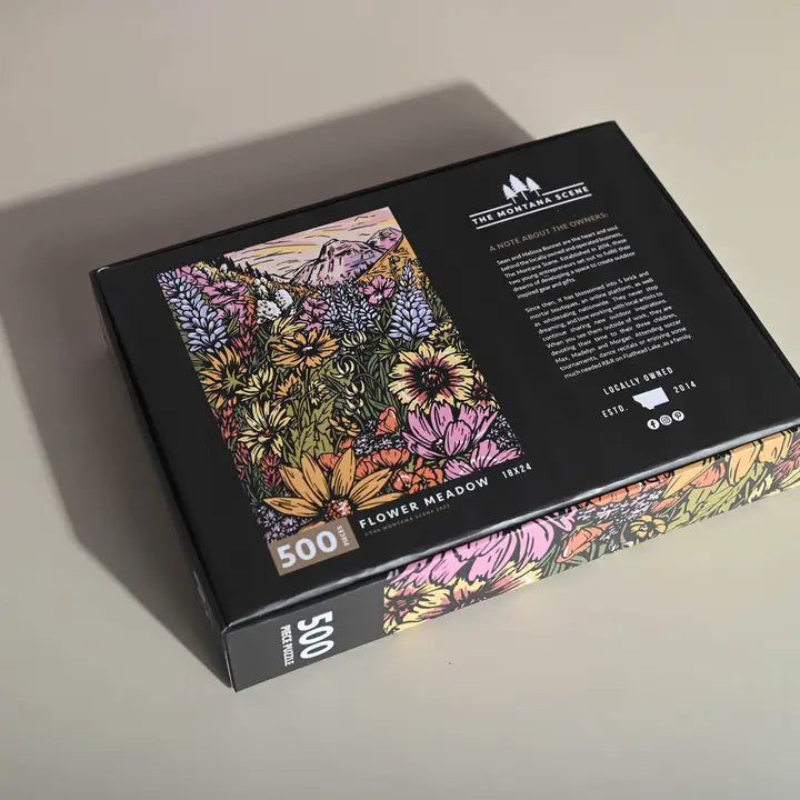 Flower Meadow 500 piece puzzle box on black packaging with colorful meadow artwork