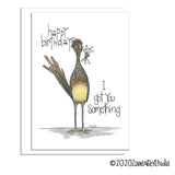 Birthday card featuring a tall roadrunner holding a gift and handwritten text