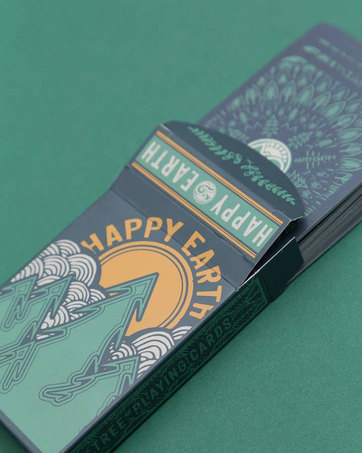 Happy Earth deck box for tree themed playing cards with teal and orange artwork.
