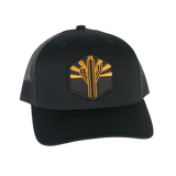 Black Saguaro cactus emblem trucker hat with a front patch and mesh sides