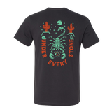 Back view of a dark unisex tee with turquoise scorpion skeleton design and red UNDER STONE text and EVERY at the bottom.