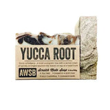 Yucca Root soap bar with marbled brown and cream swirls and a textured barklike side panel.