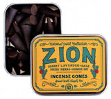 Zion National Park incense cones in an orange tin with decorative label, opened to reveal dark cone shaped incense pieces