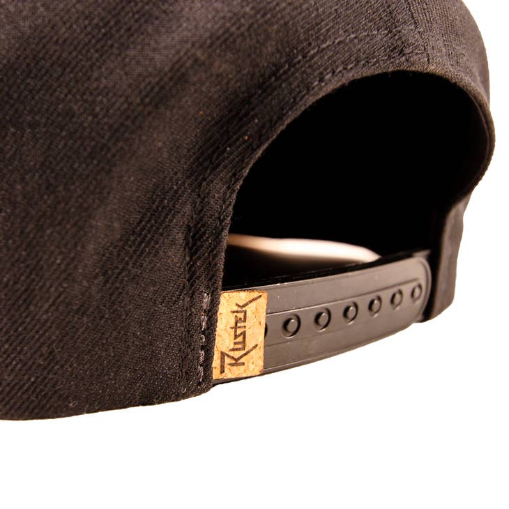 Moonlit Mesa Cork Flatbrim back view with black crown and adjustable snapback strap