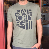 State Forty Eight army green tee with large dark gray graphic text across the front